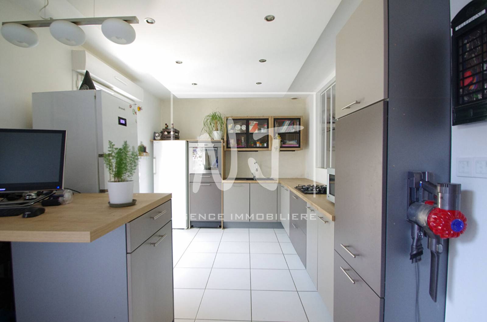 Pièce de vie avec accès jardin